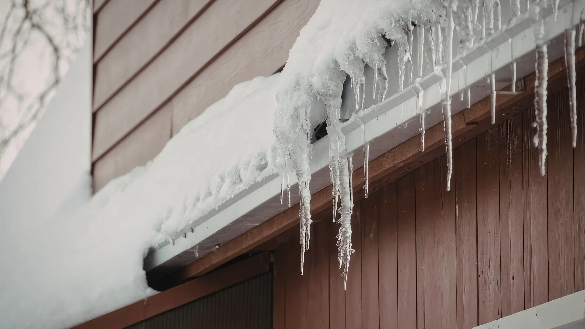 Ice accumulated on the edges of the roof